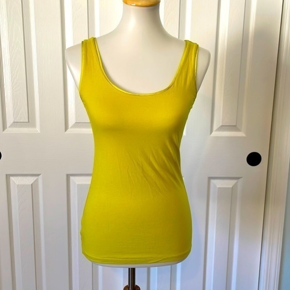 Ann Taylor sleeveless tank top, stretchy material with shiny trim around sleeves